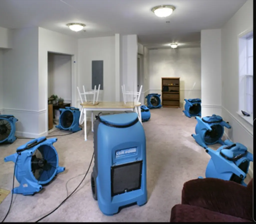 Air movers and dehumidifier setup for Water Damage Restoration in Snyder